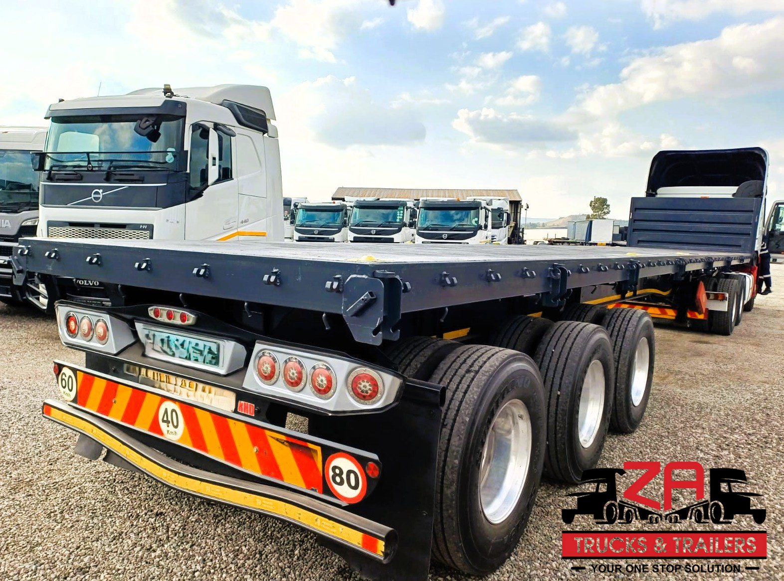 2023 HENRED FRUEHAUF TRI-AXLE FLAT DECK TRAILER #53012